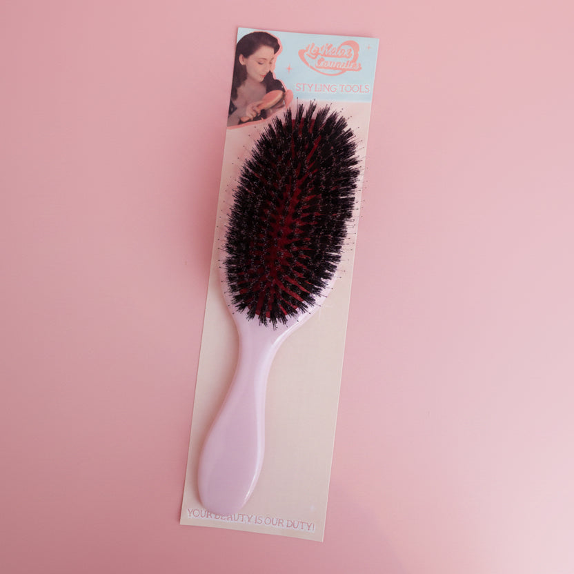 Pink bristle finishing brush