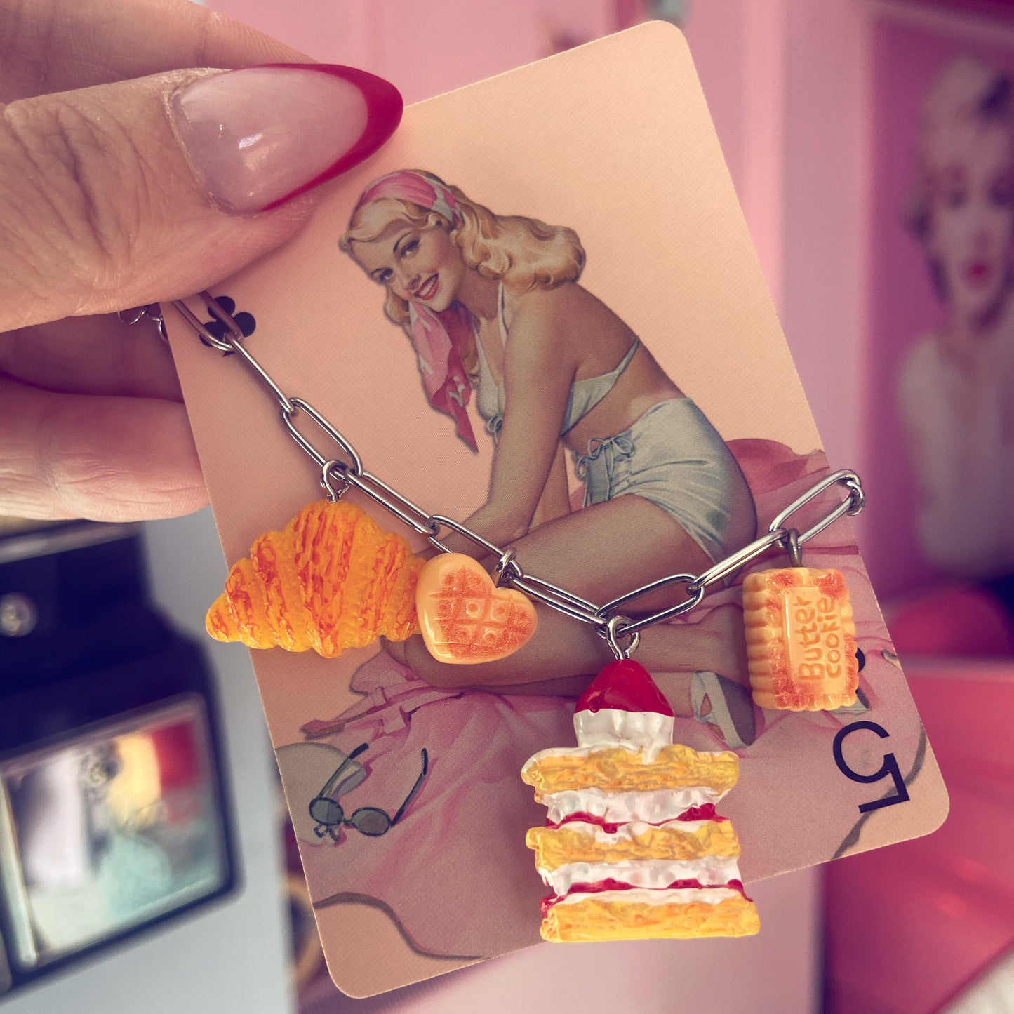 Hand holding a card with a vintage-style illustration of a woman and food items.