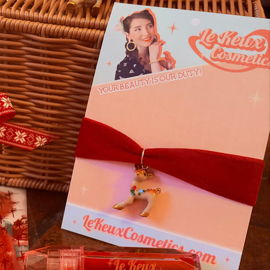 Le keux Cosmetics product with packaging and wicker basket on a wooden surface