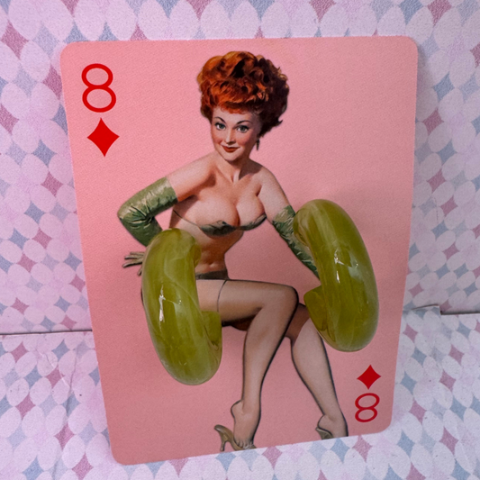 Playing card with a woman and number 8 on a patterned background